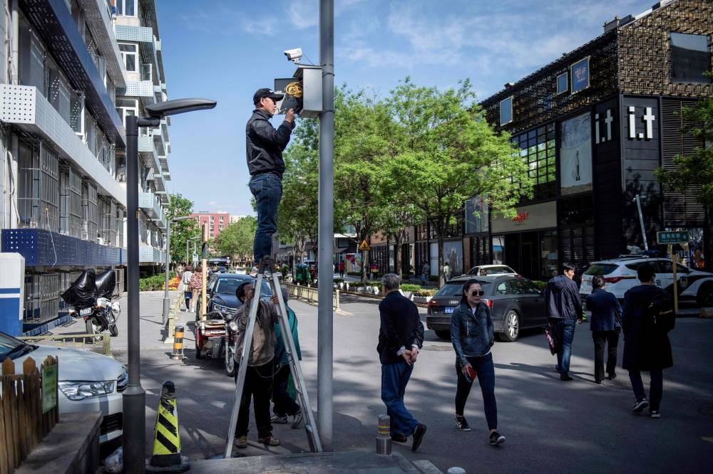 ‘Watched the whole time’: China’s surveillance state grows under Xi