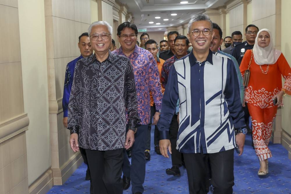 Prime Minister Datuk Seri Ismail Sabri Yaakob is welcomed by Finance Minister Datuk Seri Tengku Zafrul Tengku Abdul Aziz at the Ministry of Finance in Putrajaya October 6, 2023. ― Bernama pic