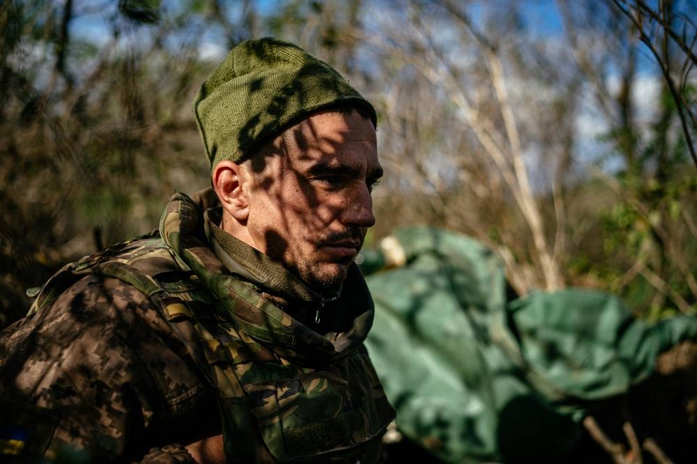 Ukrainian soldier Bogdan, 29, stands at a position along the front line in the Mykolaiv region on October 5, 2022, amid the Russian invasion of Ukraine. — AFP pic