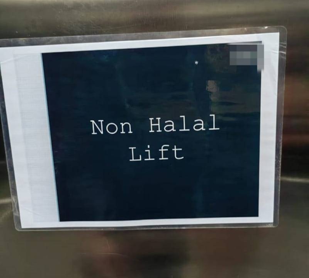 Earlier it was reported that the management of a hotel stated that the premises had put up a ‘non-halal lift’ sticker in the lift which was used to carry non-halal and perishable goods. — Picture from Facebook/Siti Kasim 