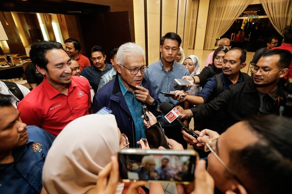 Perikatan Nasional secretary-general Datuk Seri Hamzah Zainudin speaks to reporters after attending a Bersatu supreme council meeting in Shah Alam October 6, 2022. ― Picture by Sayuti Zainudin