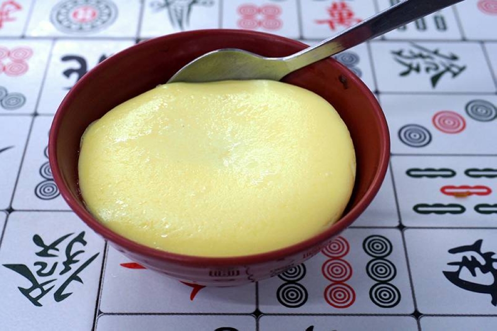 Steamed egg custard for dessert with a smooth texture and it's not too sweet.