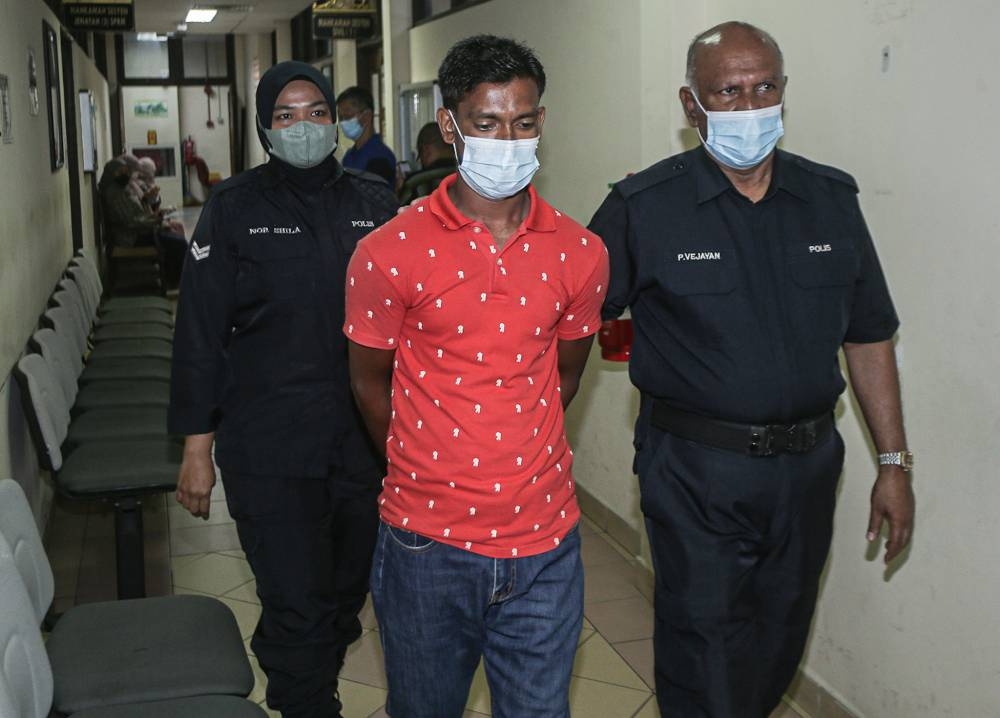 Bangladeshi estate worker Khan Obaydul is seen at the Ipoh Sessions court after he pleaded guilty to offering RM50 to a police sergeant in Ayer Tawar, Manjung. ― Picture by Farhan Najib