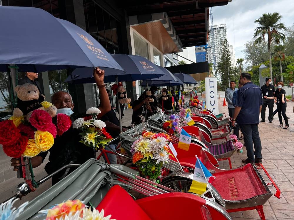 Ascott Gurney Penang 'adopted' the trishaw riders in Penang by sponsoring the upgrading and repair costs of the trishaws. ― Picture by Opalyn Mok