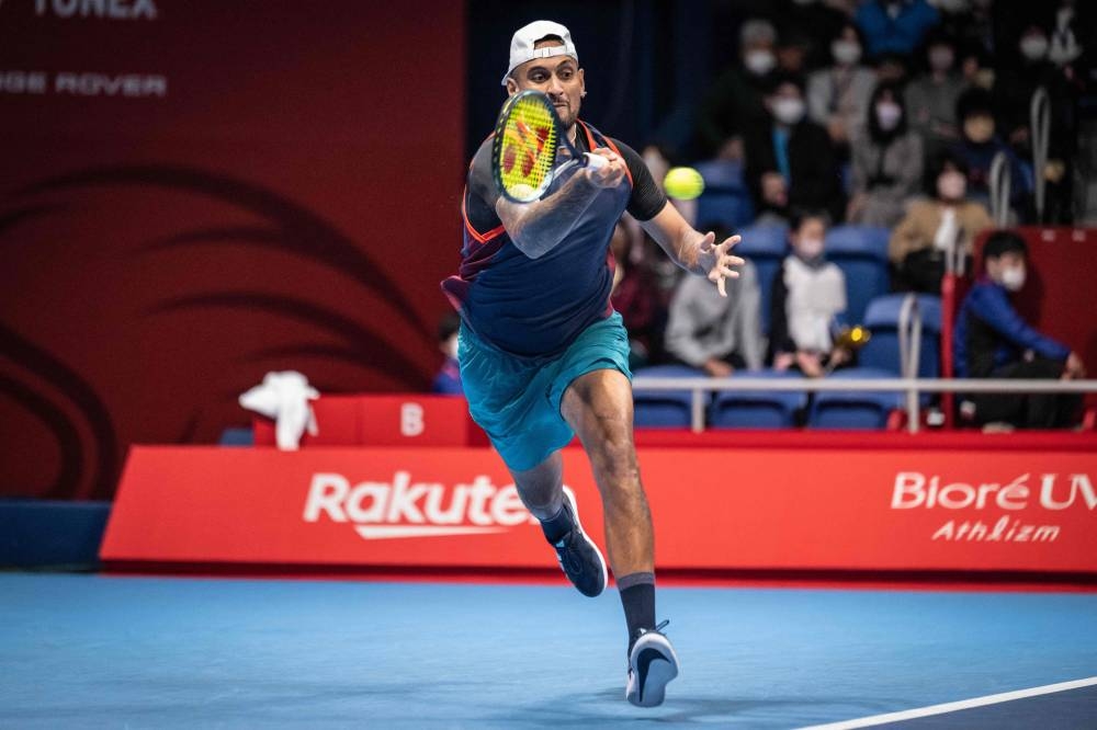 Nick Kyrgios of Australia hits a return against Kamil Majchrzak of Poland during their men's singles match at the Japan Open tennis tournament in Tokyo on October 6, 2022. — AFP pic