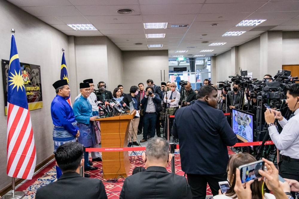 Finance Minister Datuk Seri Tengku Zafrul Abdul Aziz speaks during a press conference at Parliament building in Kuala Lumpur, October 7, 2022. — Picture by Firdaus Latif