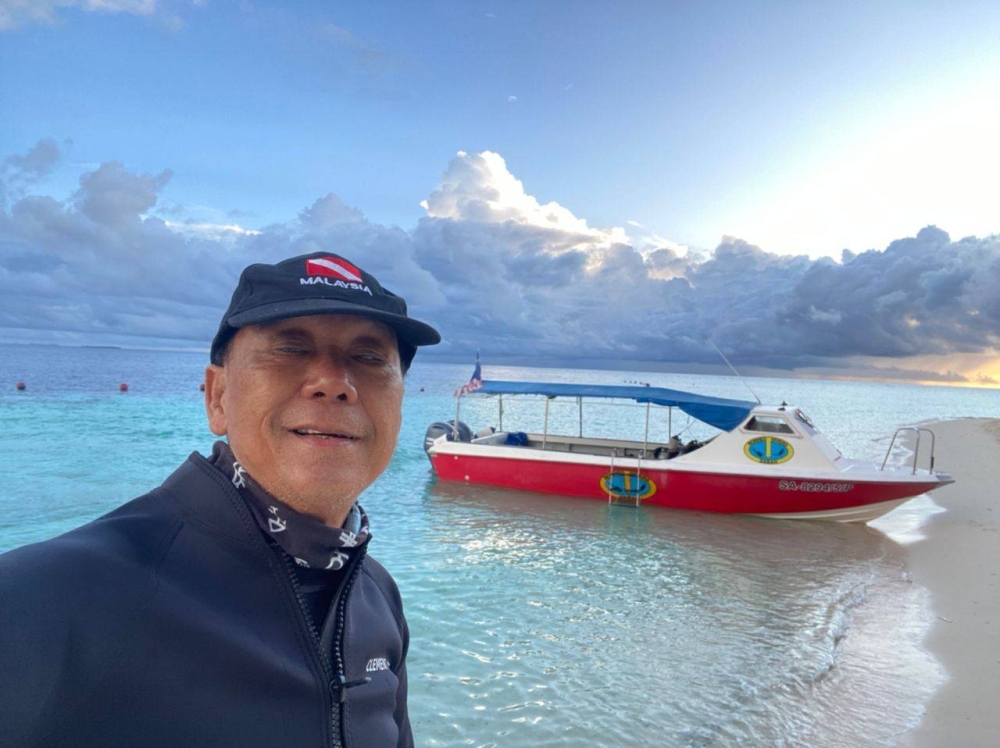 Sabah diving industry veteran Clement Lee says stakeholders need to work together to conserve Sipadan island. ― Picture courtesy of Clement Lee
