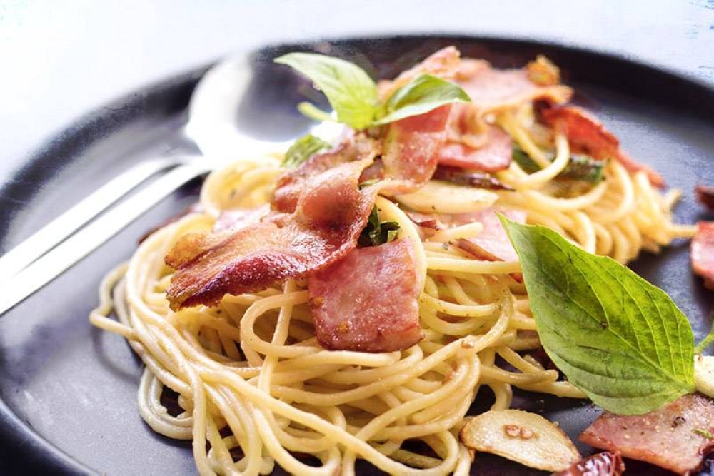 Scent-sational: Pasta with bacon and holy basil. — Pictures by CK Lim