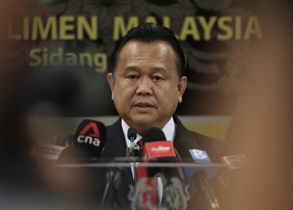 Minister of Domestic Trade and Consumer Affairs Datuk Seri Alexander Nanta Linggi speaking during a press conference at Parliament House October 3, 2022. — Bernama pic