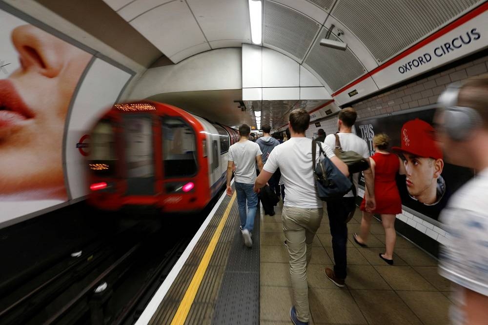 File photo of passengers getting off a Night Tube train service at Oxford Circus on the London underground system in London August 20, 2016. — Reuters pic