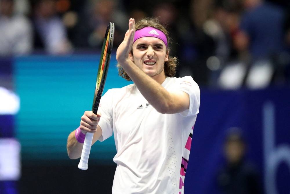 Greece’s Stefanos Tsitsipas celebrates after winning his semi-final match against Russia’s Andrey Rublev at the Astana Open in Astana, Kazakhstan, October 8, 2022. — AFP pic