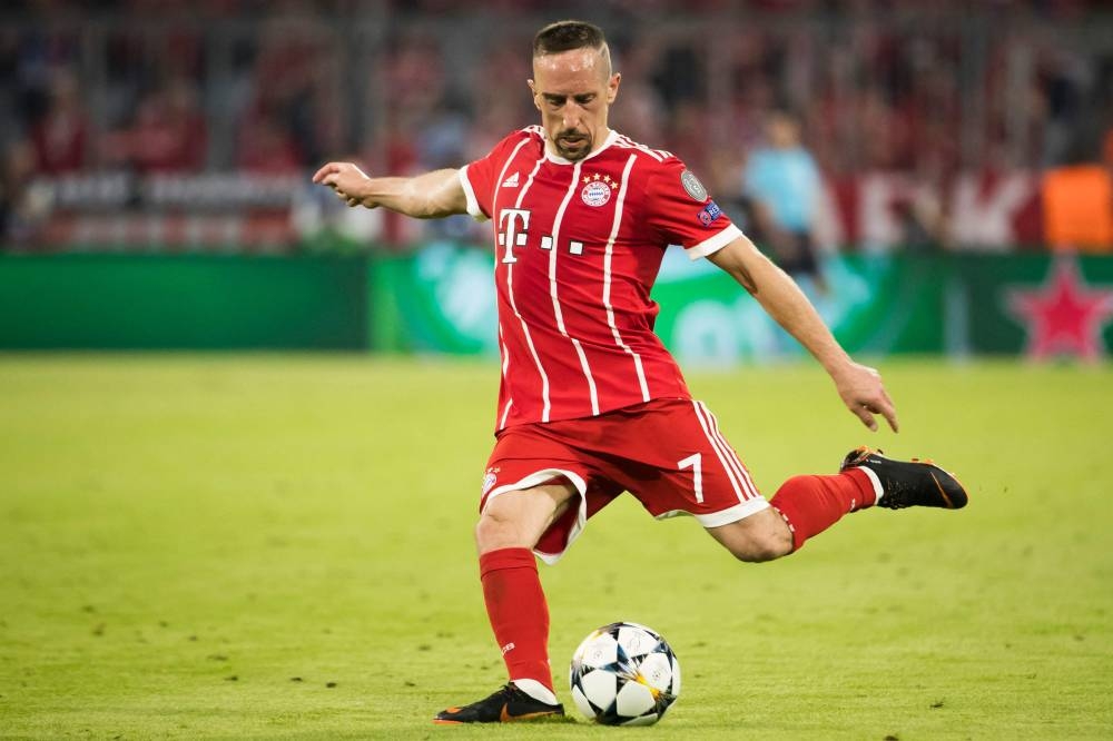 In this file photo taken on April 25, 2018 Bayern Munich’s French midfielder Franck Ribery passes the ball during the UEFA Champions League semi-final first-leg football match FC Bayern Munich v Real Madrid CF in Munich, southern Germany. — AFP pic