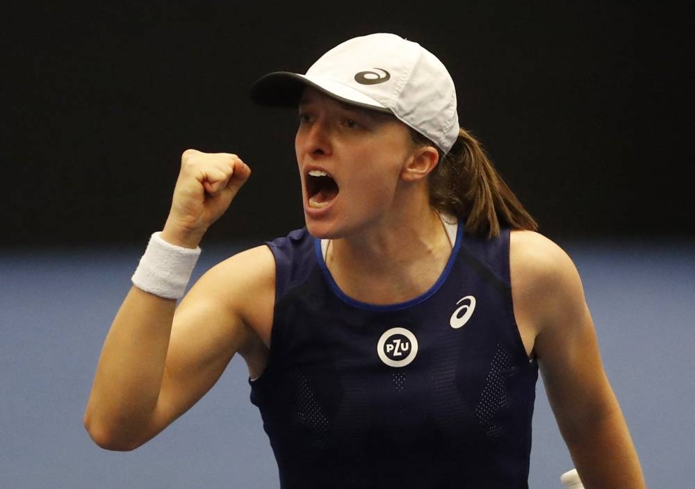 Poland's Iga Swiatek celebrates winning her semi final match against Russia's Ekaterina Alexandrova at the CEZ Arena, Ostrava, Czech Republic October 8, 2022. — Reuters pic