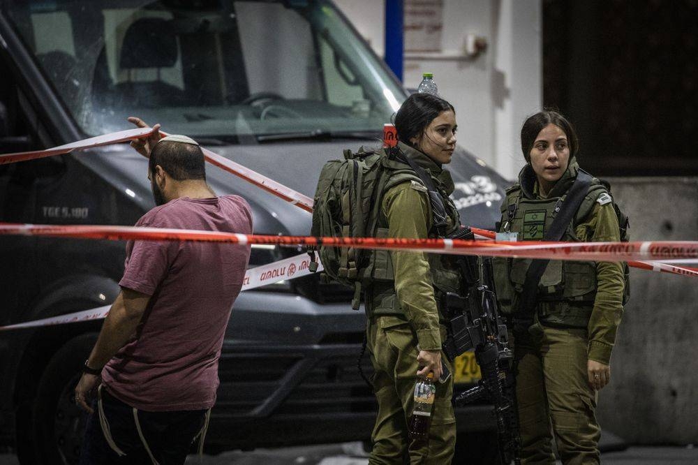 Israeli Security Forces stand at the scene, where two of their teammates seriously injured after a shooting attack at Shuafat Palestinian refugee camp checkpoint, October 8, 2022. — DPA / Picture Alliance pic via Reuters