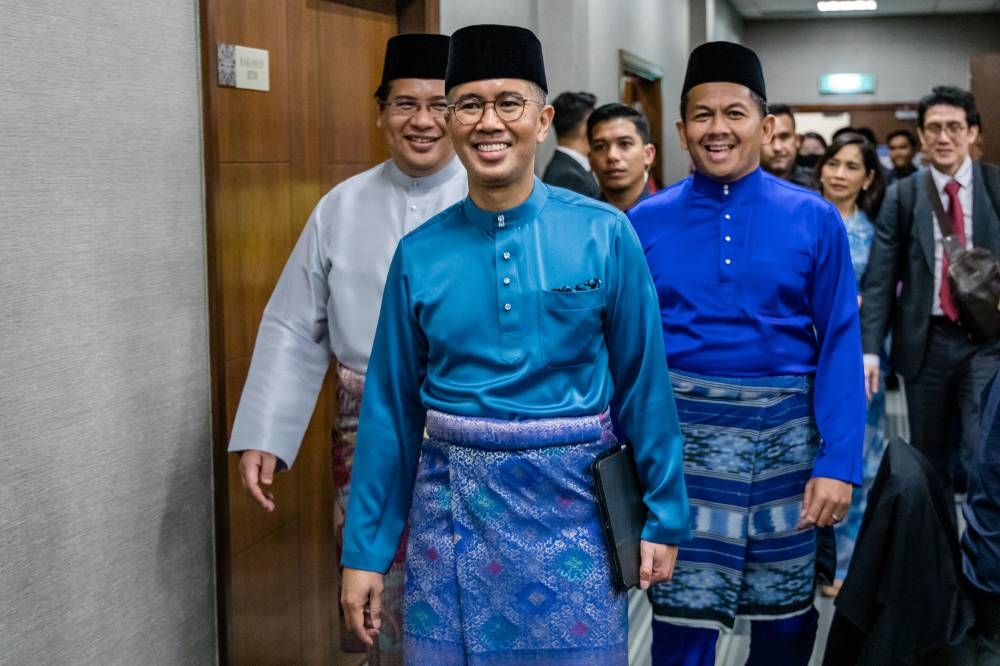 Finance Minister Tengku Datuk Seri Zafrul Abdul Aziz arrive for press conference at parliament in Kuala Lumpur on October 7, 2022. — Picture by Firdaus Latif