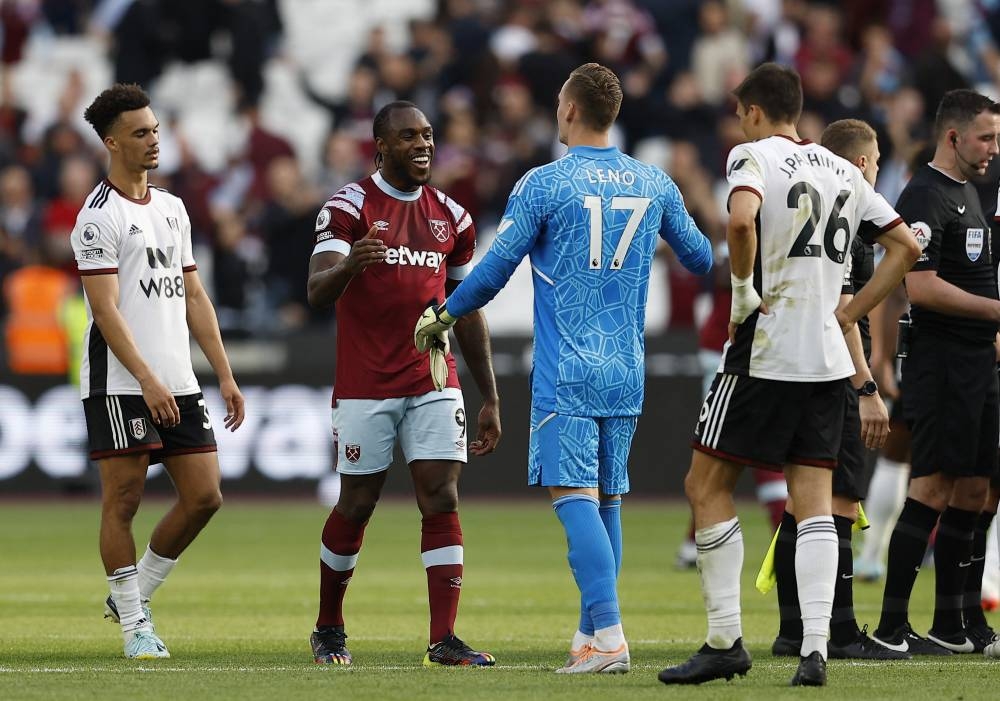 West Ham United's Michail Antonio and Fulham's Bernd Leno after the West Ham United v Fulham match at London Stadium, London, Britain  October 9, 2022. — Reuters pic