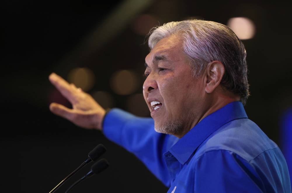 Barisan Nasional chairman Datuk Seri Ahmad Zahid Hamidi speaks at the 76th MIC General Assembly in Mitec, Kuala Lumpur, October 10, 2022. — Bernama pic 