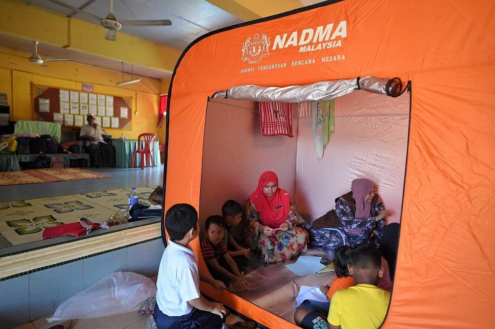 File picture of flood evacuees at a flood evacuation centre in Alor Setar, Kedah, October 10, 2018. — Bernama pic