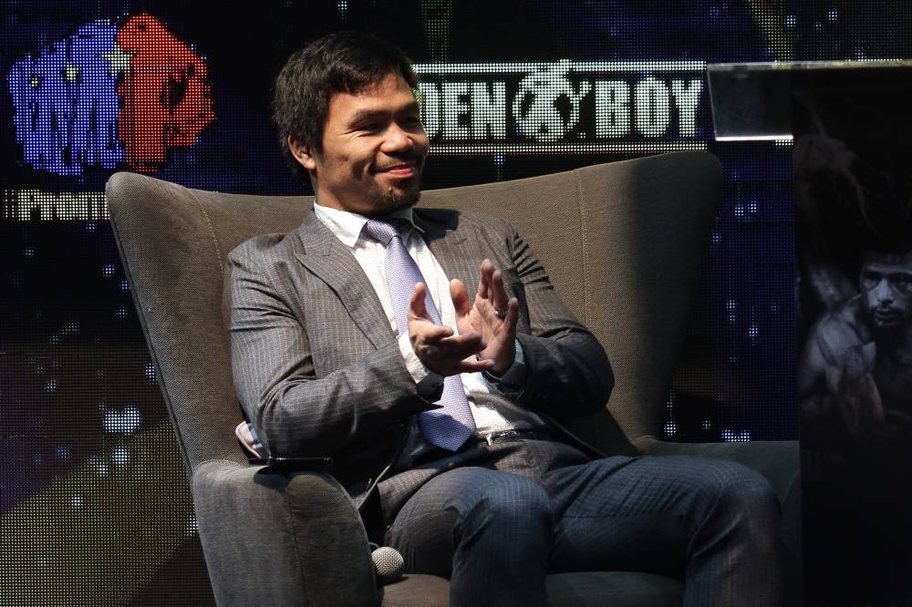 Pacquiao said he will use the upcoming bout to decide if he wants to return to professional boxing or if he will stay on the exhibition circuit. — Picture by Miera Zulyana
