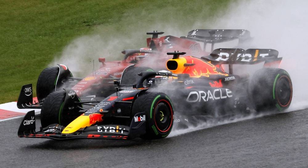 Ferrari’s Charles Leclerc and Red Bull’s Max Verstappen after the start of the race at the Japanese Grand Prix, Suzuka Circuit, Suzuka, Japan, October 9, 2022. — Reuters pic 