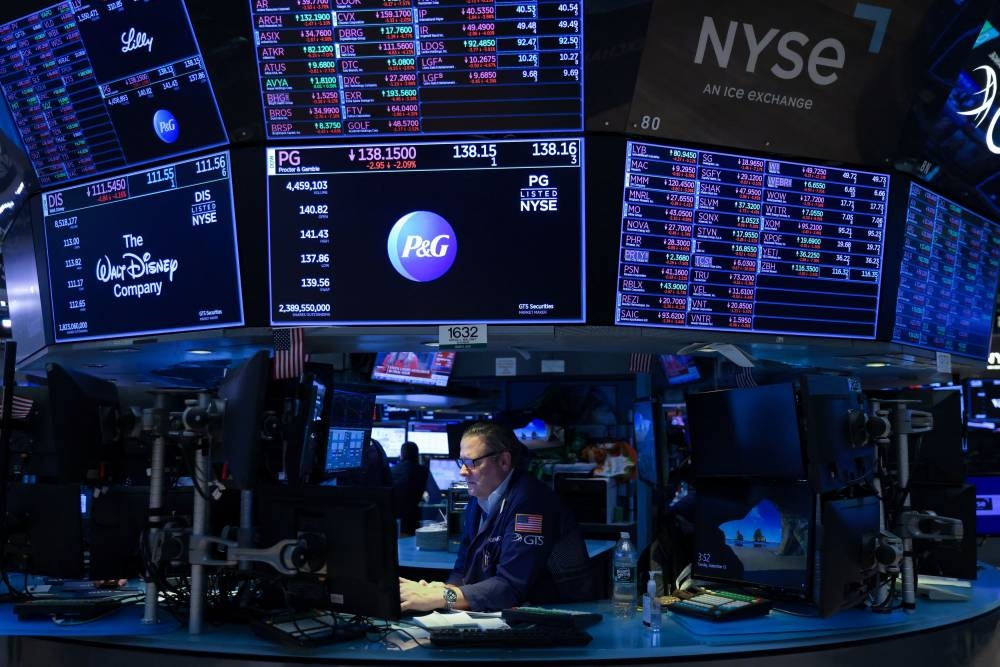 A trader works on the trading floor at the New York Stock Exchange (NYSE) in Manhattan, New York September 13, 2022. — Reuters pic