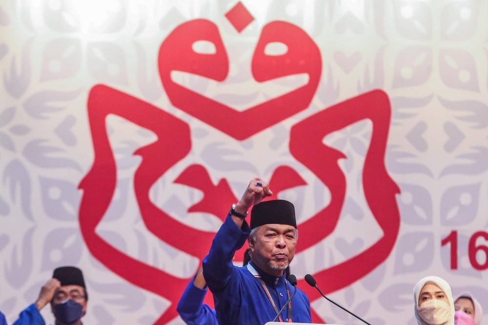Umno president Datuk Seri Ahmad Zahid Hamidi giving his speech at the 2021 Umno General Assembly at World Trade Centre in Kuala Lumpur, March 19, 2022. ― Picture by Hari Anggara