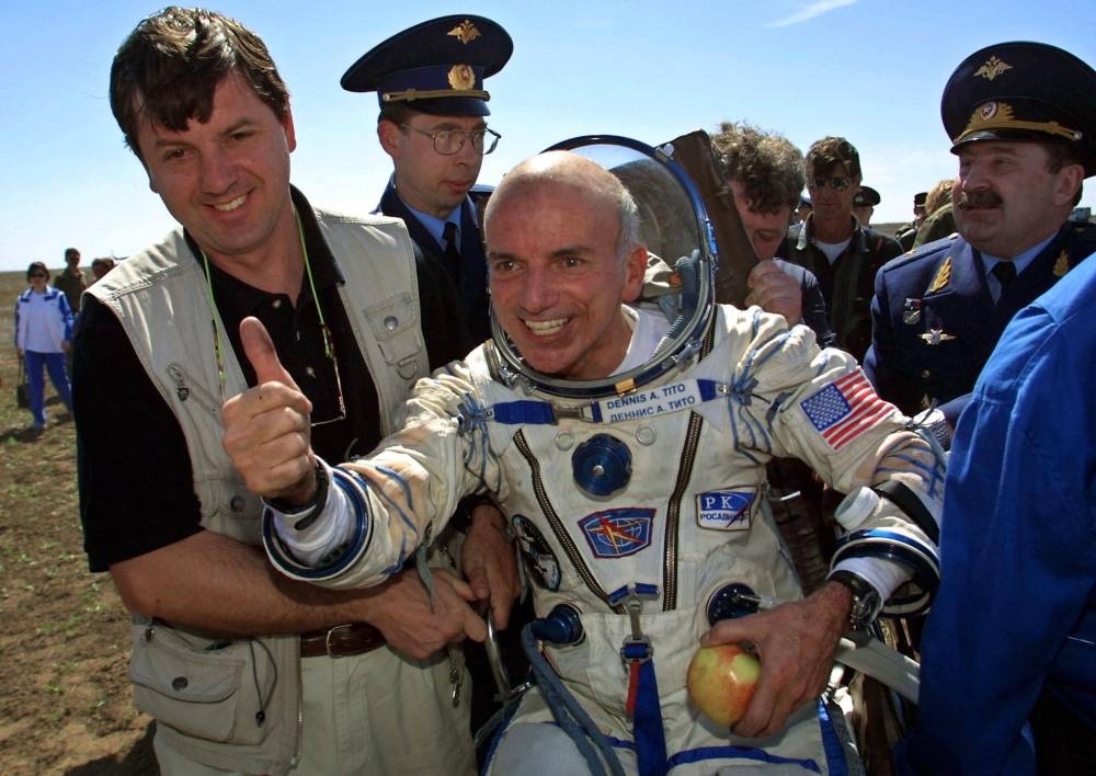 US space tourist Dennis Tito celebrates after his landing near the Kazakh town of Arkalyk May 6, 2001. — Reuters pic