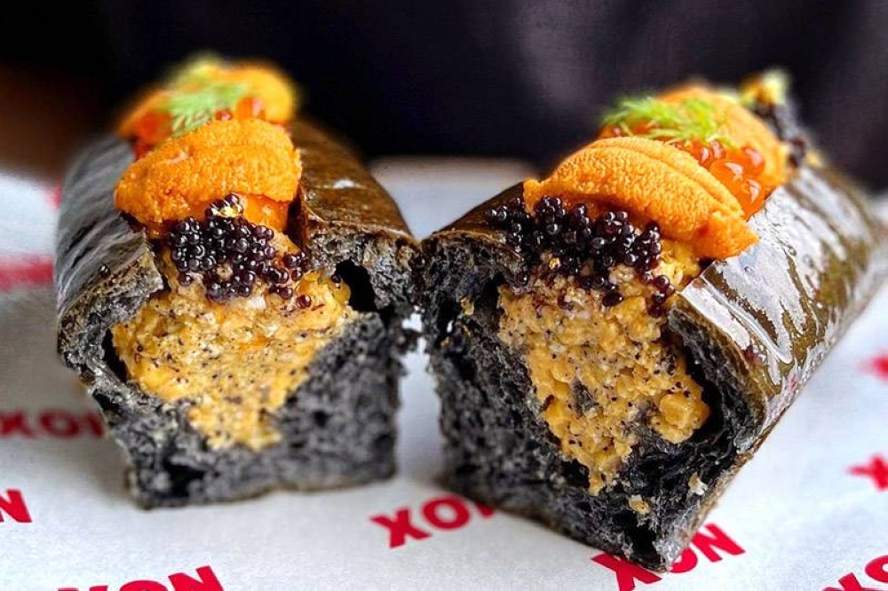 Plenty of fresh sea urchin on NOX’s Uni Truffle Egg Roll.