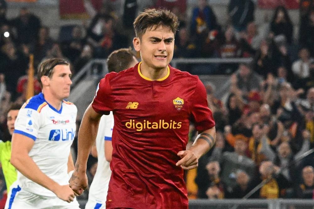 AS Roma's Argentinian forward Paulo Dybala reacts, due to an injury, after scoring a penalty kick against Lecce at the Olympic stadium in Rome October 9, 2022. — AFP pic