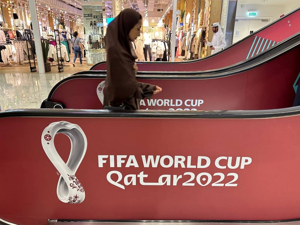 World Cup branding seen on an escalator at a mall in Qatar October 13, 2022. — Reuters pic