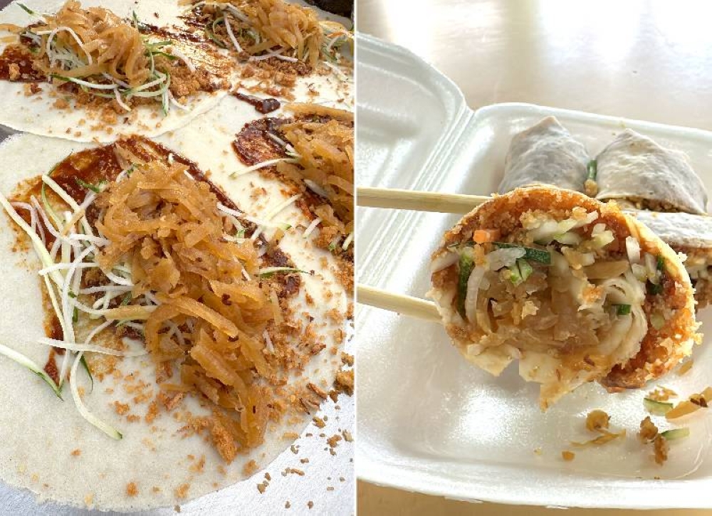 Before the 'popiah' is rolled up, it is crowned with stewed yam bean (left). The 'popiah' is a little drier than the usual ones but it has crispy bits, cucumber, carrot and yam bean (right).
