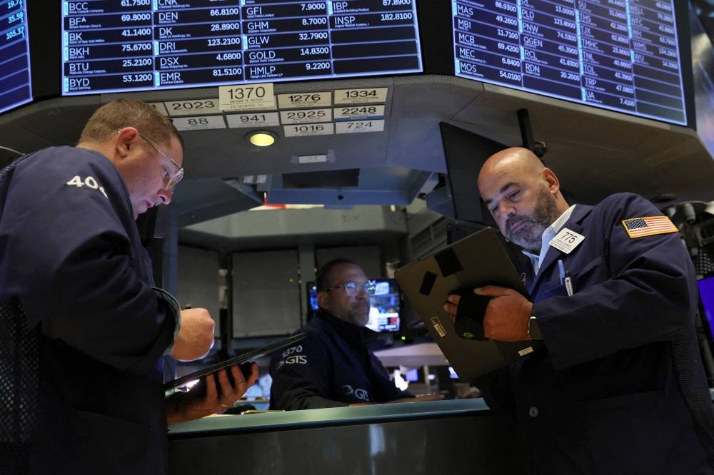 The Dow Jones Industrial Average fell 403.89 points, or 1.34 per cent, to 29,634.83, the S&P 500 lost 86.84 points, or 2.37 per cent, to 3,583.07 and the Nasdaq Composite dropped 327.76 points, or 3.08 per cent, to 10,321.39.— Reuters pic
