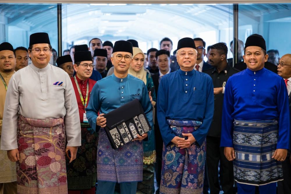 Prime Minister Datuk Seri Ismail Sabri Yaakob and Finance Minister Tengku Datuk Seri Zafrul Abdul Aziz arriving to present the 2023 budget at the parliament building in Kuala Lumpur on October 7, 2022. — Picture by Firdaus Latif