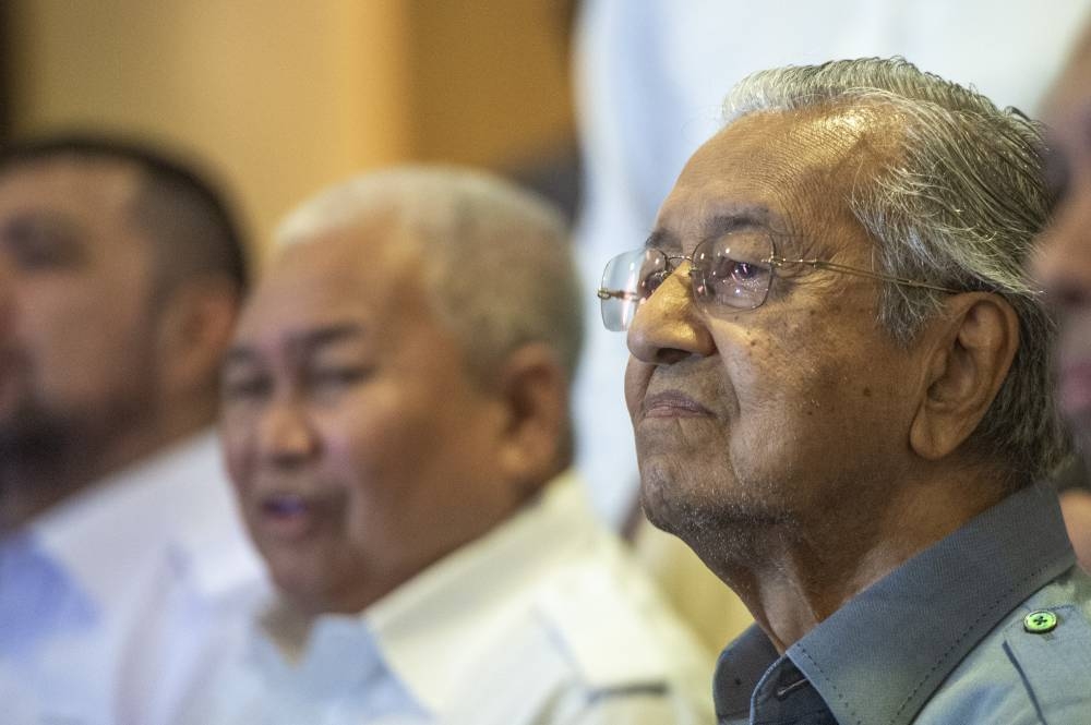 Tun Dr Mahathir Mohamad finally admitted today that he had asked Datuk Seri Ahmad Zahid Hamidi to dissolve Umno. -— Picture Shafwan Zaidon