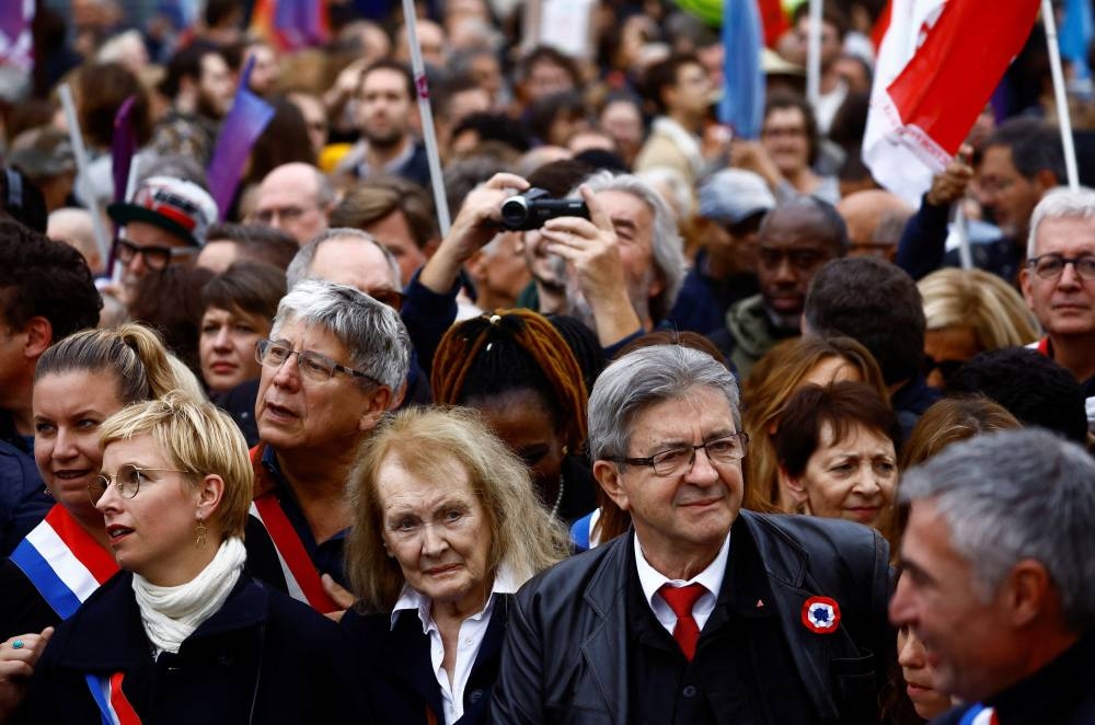 Jean-Luc Melenchon, leader of French far-left opposition party La France Insoumise (France Unbowed), and leader of the New Ecologic and Social People's Union (NUPES), takes part in a protest against soaring inflation and what they call a lack of government action to fight climate change, in Paris, France October 16, 2022. — Reuters pic