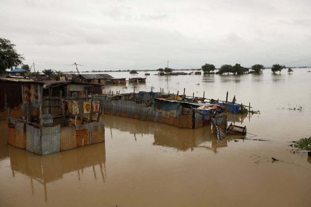 Houses are seen submerged in flood waters in Lokoja, Nigeria October 13, 2022. — Reuters pic
