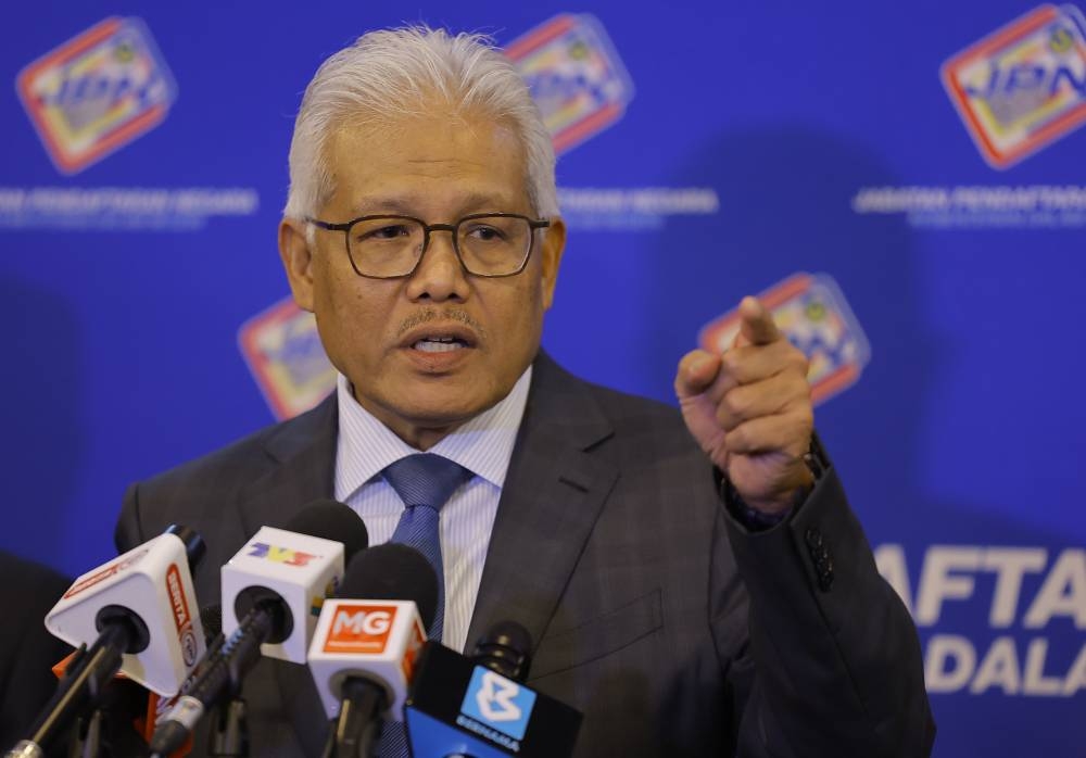 Datuk Seri Hamzah Zainudin speaks during a press conference at the National Registration Department in Putrajaya October 17, 2022. — Bernama  pic