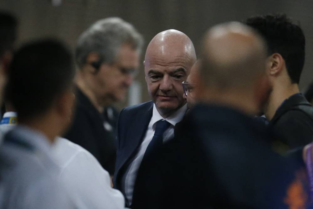 Infantino praised Qatar’s 'groundbreaking reforms' that are 'changing the lives of thousands of workers for the better'. — AFP pic 