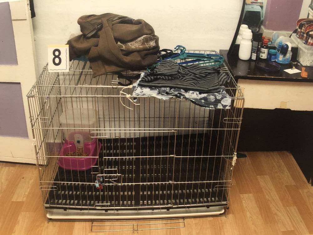 Azlin Arujunah and her husband Ridzuan Mega Abdul Rahman confined their five-year-old son in their pet cat’s metal cage. — Picture from Court document via TODAY