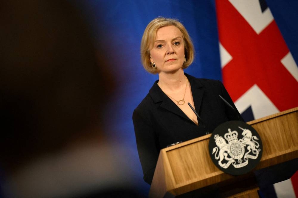 British Prime Minister Liz Truss attends a news conference in London October 14, 2022. — Reuters pic