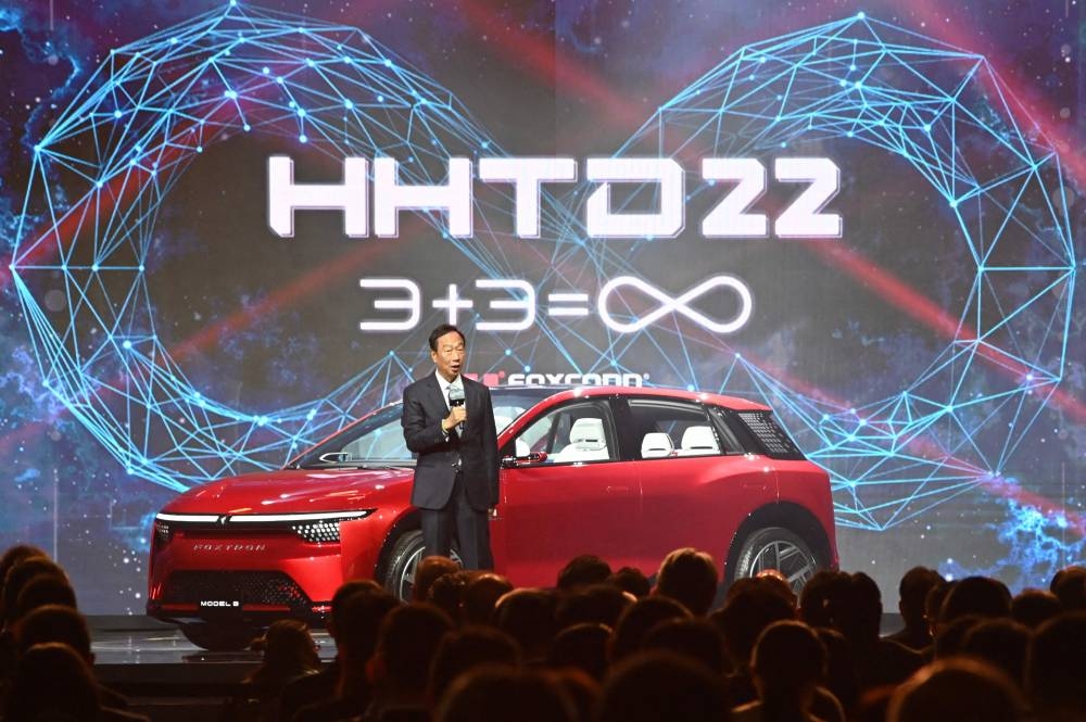 Foxconn founder Terry Gou introduces the Model B electric vehicle prototype during the annual Hon Hai Tech Day (HHTD) at Nangang Exhibition Hall in Taipei on October 18, 2022. — AFP pic