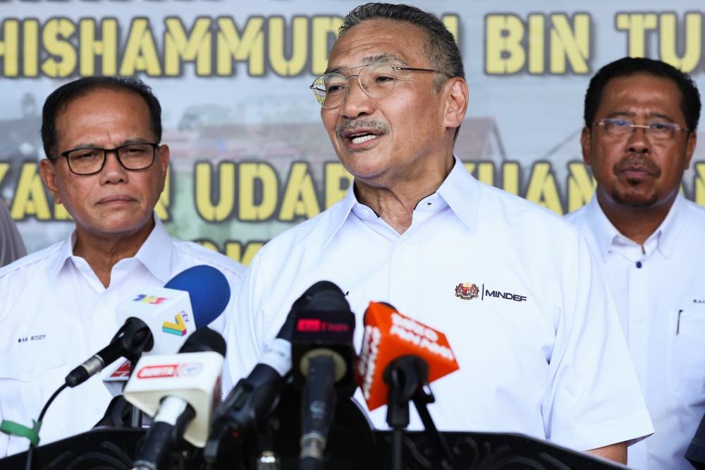 Senior Defence Minister Datuk Seri Hishammuddin Hussein speaks at a press conference after handing over flood assets to the Pahang state government represented by Mentri Besar Datuk Seri Wan Rosdy Wan Ismail at the Kuantan Air Base October 18, 2022. — Bernama pic