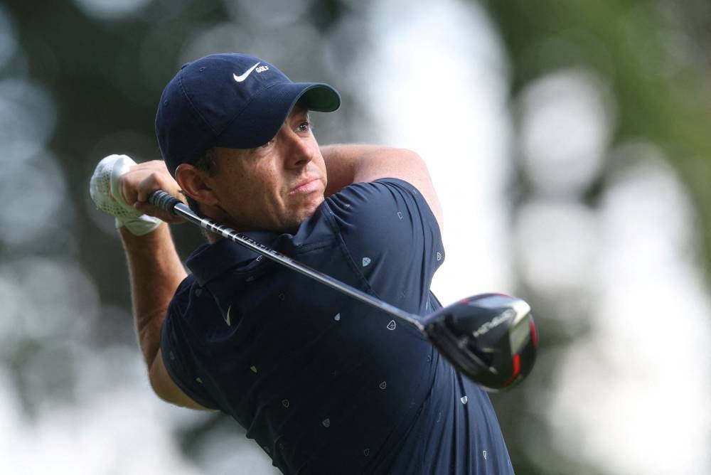 Star PGA players such as four-time major winner Rory McIlroy (pic), Jon Rahm and top-ranked Scottie Scheffler, the reigning Masters champion, have committed to playing 17 events with elevated purses next year as a way to combat more players departing for the upstart LIV Series. — Reuters pic