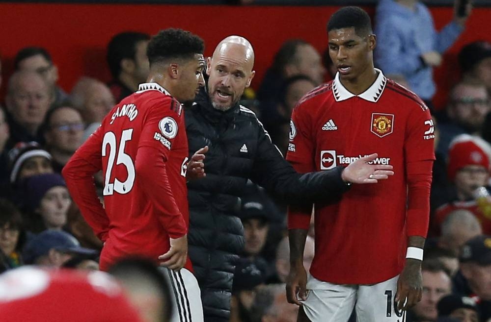 Manchester United manager Erik ten Hag gives instructions to Jadon Sancho and Marcus Rashford during the match against Tottenham Hotspur at Old Trafford, Manchester October 19, 2022. — Reuters pic