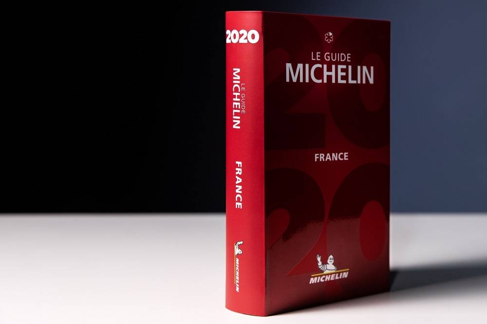 The Michelin Guide, with its trademark red cover, dates to 1900, when its namesake Paris-based tyre company came up with the idea of encouraging budding drivers to take road trips to local attractions in their new-fangled automobiles. — AFP pic