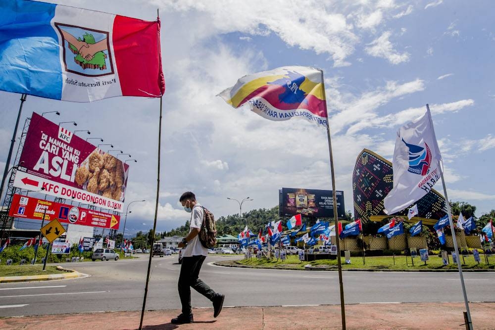 Party flags are seen in Donggongon, Penampang September 21, 2020. — Picture by Firdaus Latif