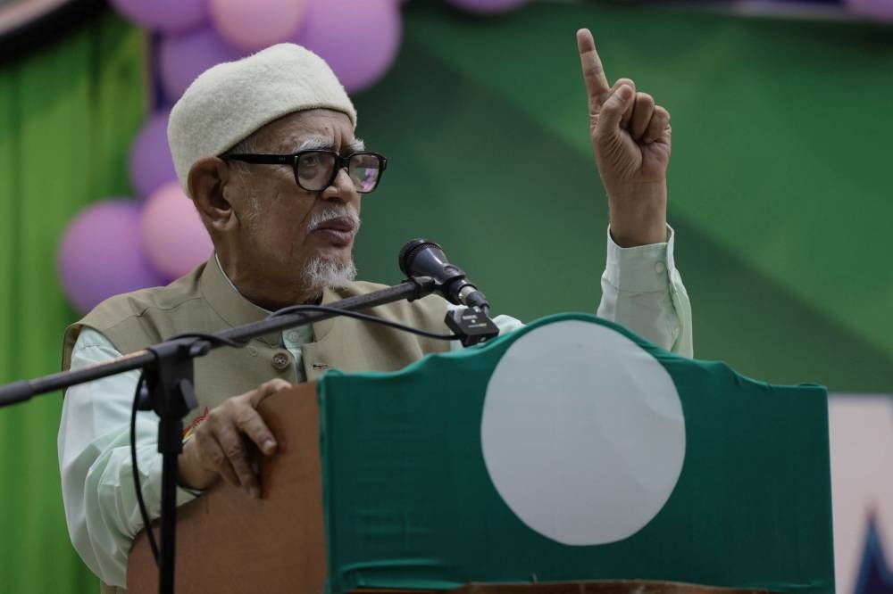 PAS president Tan Sri Abdul Hadi Awang speaks at the Marang Markas Besar P037 launch at Dewan Tok Guru in Marang October 22, 2022. — Bernama pic