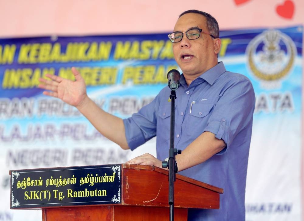 Datuk Aminuddin Md Hanafiah said he is unafraid to face the two high-profile politicians if Barisan Nasional confirms him as its Tambun candidate. ― Picture by Farhan Najib