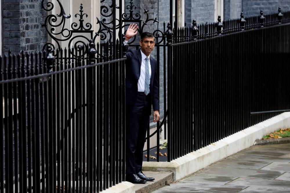 Rishi Sunak is expected to meet finance minister Jeremy Hunt today to discuss his proposals to increase taxes and squeeze public spending, the report said. — Reuters pic