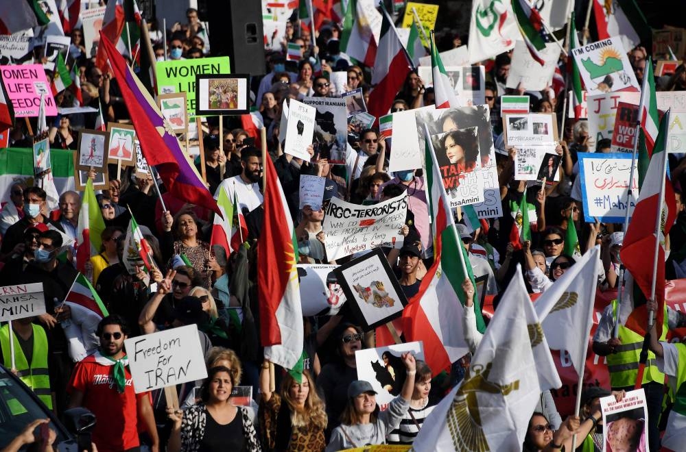 Protesters march in solidarity with protesters in Iran on the National Mall in Washington, DC, on October 22, 2022. ― AFP pic